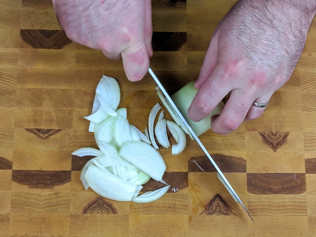 Stirring the rice and stock together