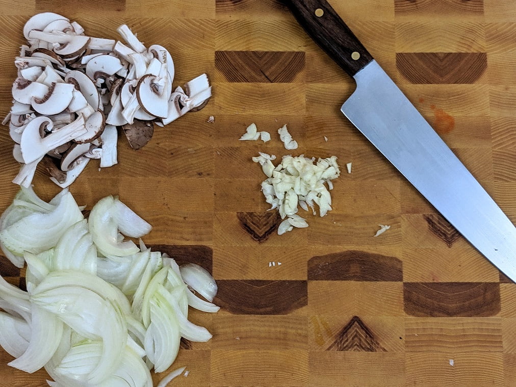 Chopped rosemary on a cutting board