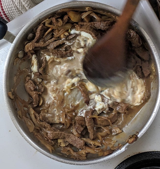 Creamy stroganoff sauce coming together