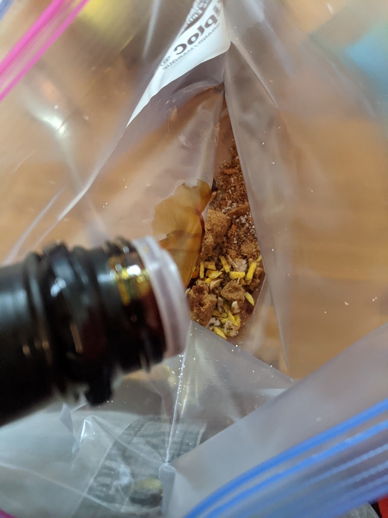 Sealing the marinade bag with air removed