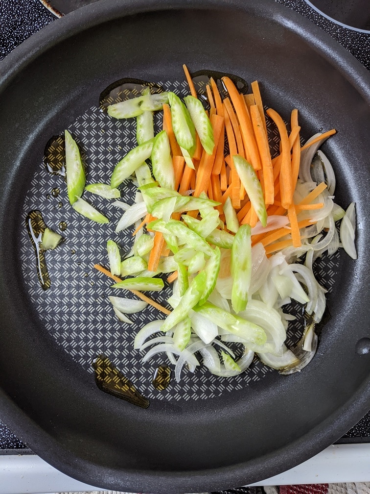 Oil heating in a large frying pan