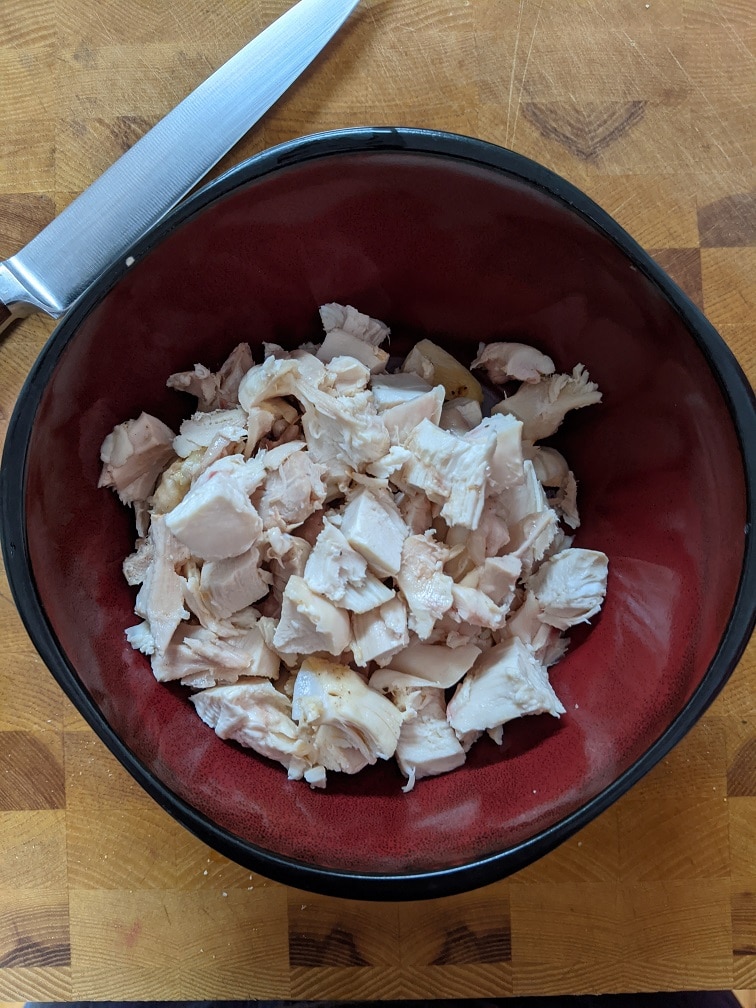 Chicken noodle soup simmering with all ingredients