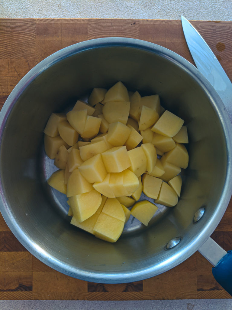 Diced yellow potatoes in a 3-quart pot