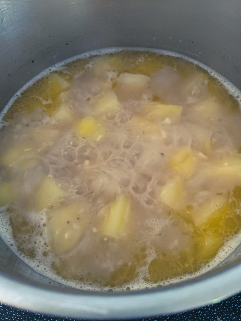 Stock level reduced to halfway up the potatoes