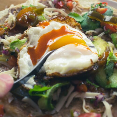 Huevos Rancheros with a sunny side up egg